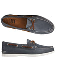 Top and side view of navy leather boat shoe with brown leather laces and a white outsole