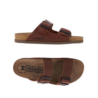 Chestnut brown leather two strap sandal with buckl closures, supportive cork misdole and brown outsole.