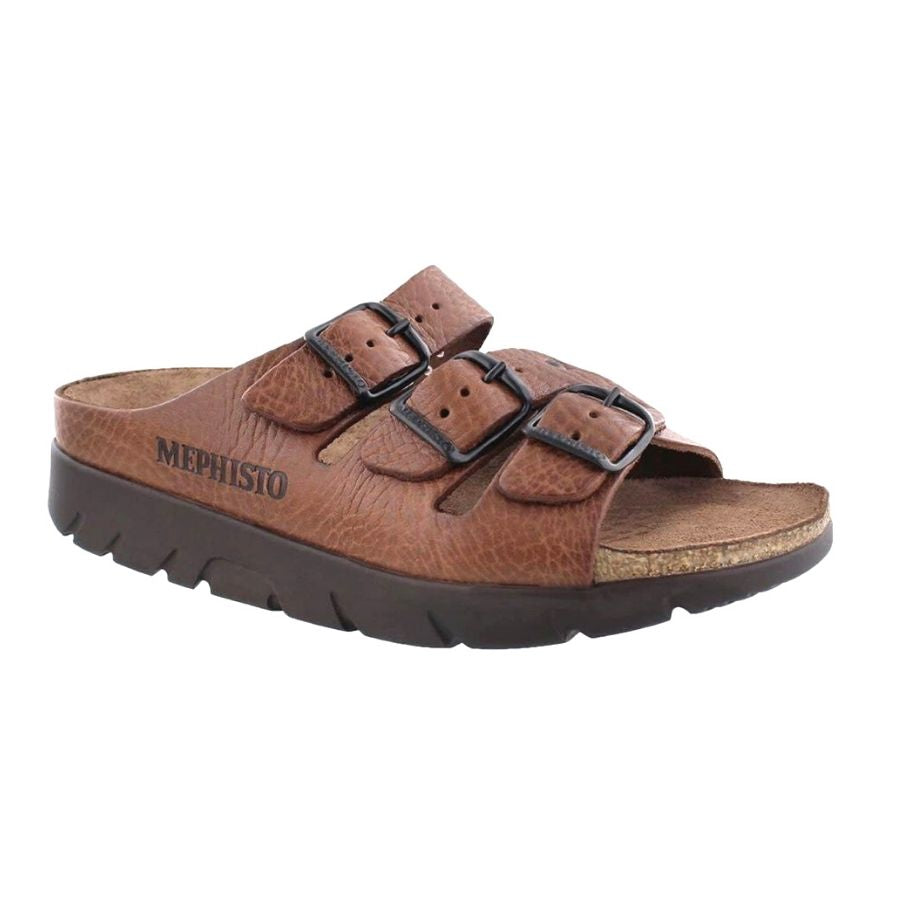 Dessert tan sandal with 3 buckle straps across foot with a dark brown outsole on the slip on Zach footed sandal by Mephisto