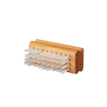 Small rectangular wooden handle with white nylon brushes