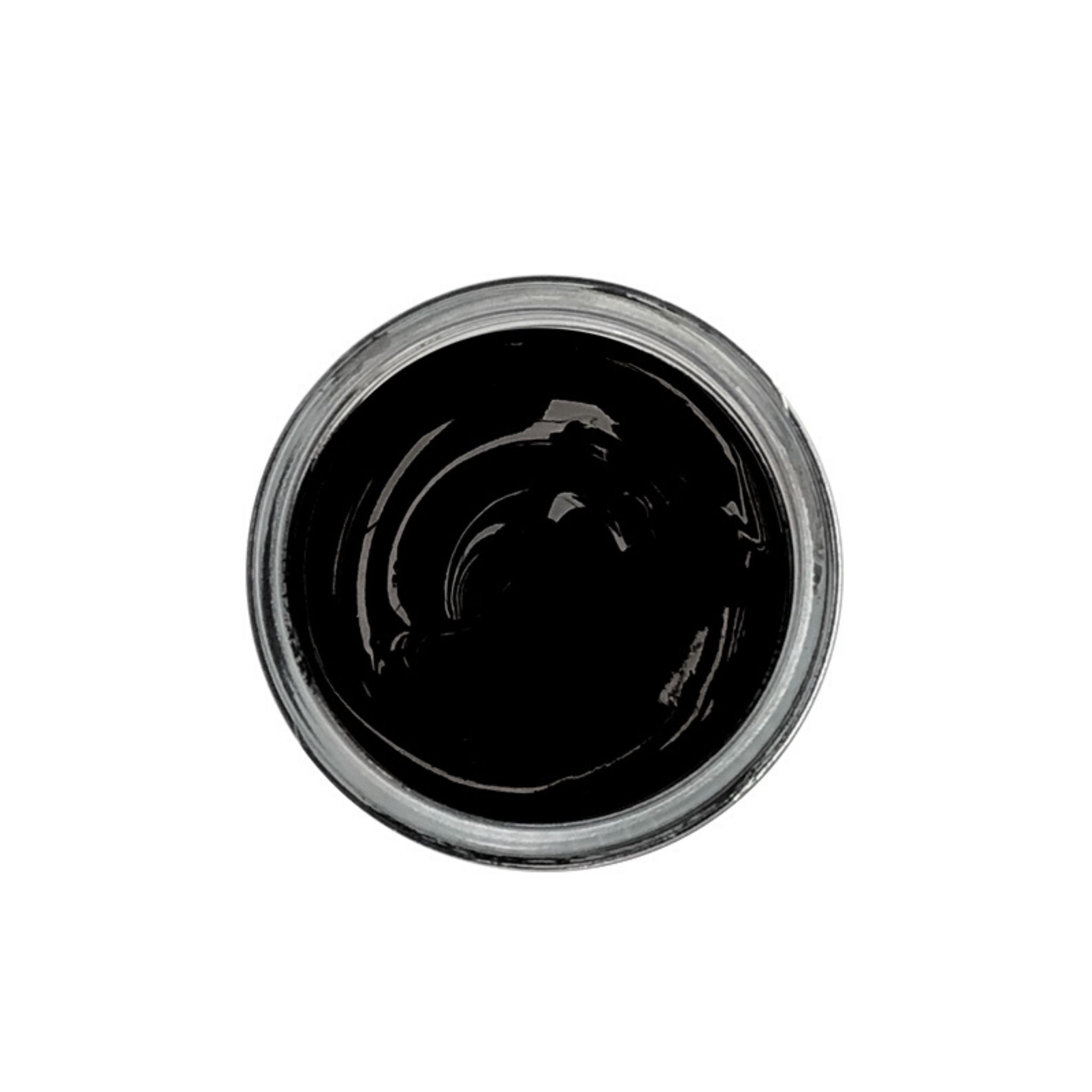 Black shoe cream polish in clear jar