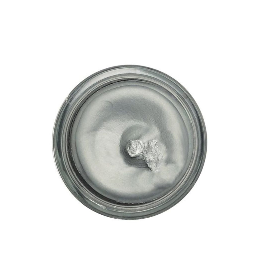 Silver shoe cream polish in clear jar