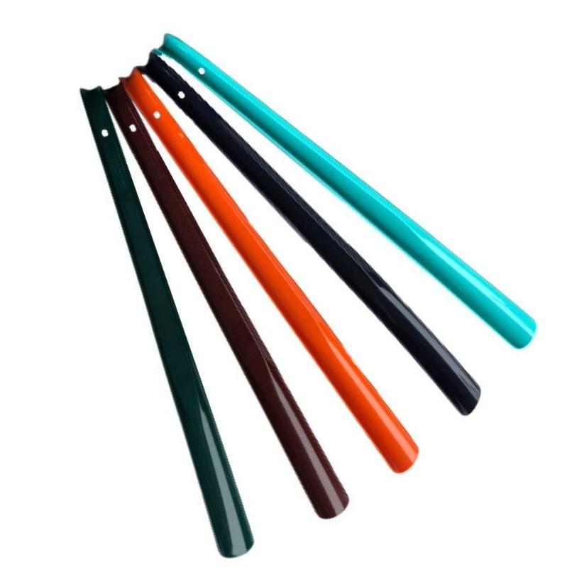 Five assorted colours of a 20 inch long plastic shoe horn.