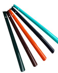 Five assorted colours of a 20 inch long plastic shoe horn.
