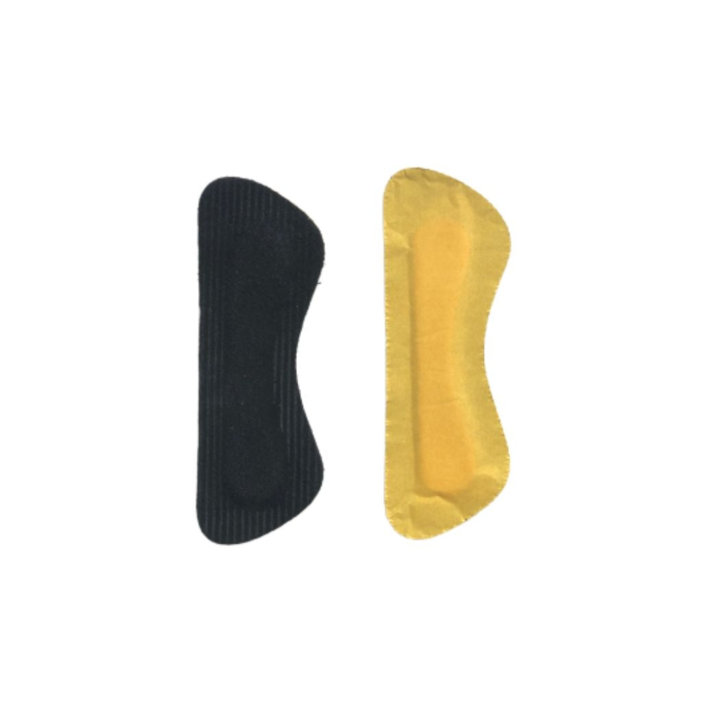 Small rounded rectangle shaped heel grips showing soft black and sticker sides