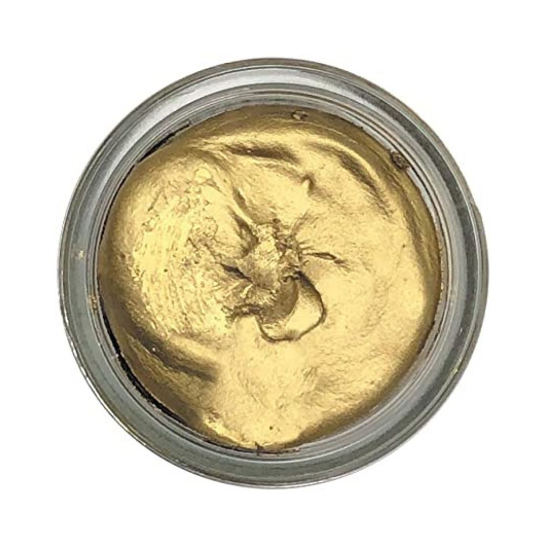 Gold shoe cream polish in clear jar