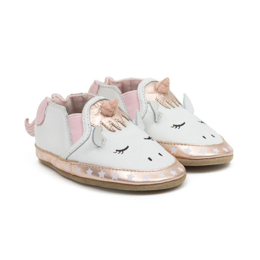 White leather shoe with 3D unicorn design.