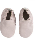 A pair of pink glittery baby shoes with grey outsoles and stars on the heels.