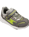 Grey sneaker with green accents and a green Z shape on side. Sneaker has Velcro closure, faux laces and a white outsole.
