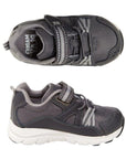 Top and side view of black and grey sneaker with Velcro strap closure and white outsole.