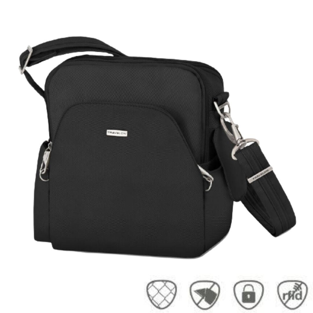 Black travel bag with silver Travelon logo on front pouch. Bag has adjustable shoulder strao and two side pockets
