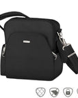 Black travel bag with silver Travelon logo on front pouch. Bag has adjustable shoulder strao and two side pockets