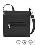Black crossbody bag with front flapped pocket and front horizontal zippered pocket. Bag has silver zippers and clasps.
