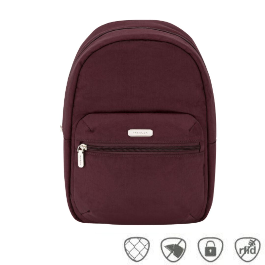Slim burgundy backpack with front zippered pocket. Silver Travelon logo on front pouch.