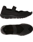 Side view of the black Comfi Sandal by Bernie Mev shows thick tread, over the foot strap, and woven fabric upper and the top view shows black footbed and peep toe