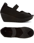 The Hallie wedge by Bernie Mev side view shows high thick black wedge and the woven upper peep toe and single strap while top view shows peep toe, open foot and black footbed