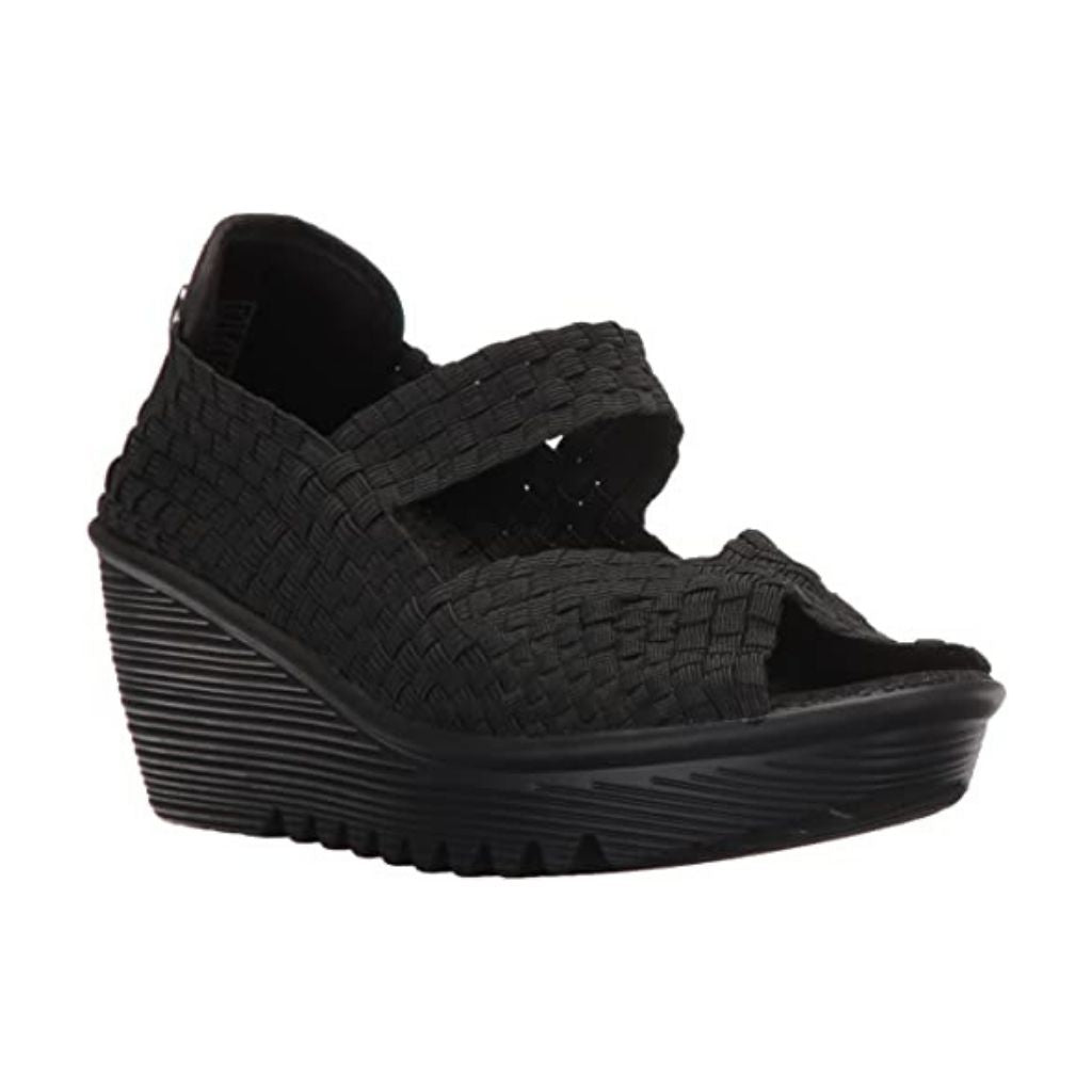 Black thick wedge Hallie sandal by Bernie Mev has a peep toe, front of foot stretch strap and a back heel formed by the woven fabric upper