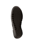 Black outsole has treads along side and thick wedge on the Hallie by Bernie Mev