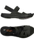 Top and side view showing the Liv sandal in black by Bernie Mev with a black  footbed and rubber outsole, black stretch woven uppers with 3 straps across foot and two at the ankle