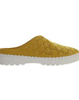 Yellow coloured mule with laser cut outs and studs. These Bernie Mev shoes have a white outsole.