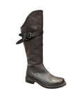 Tall brown boots with a small heel and brass buckles across calf.