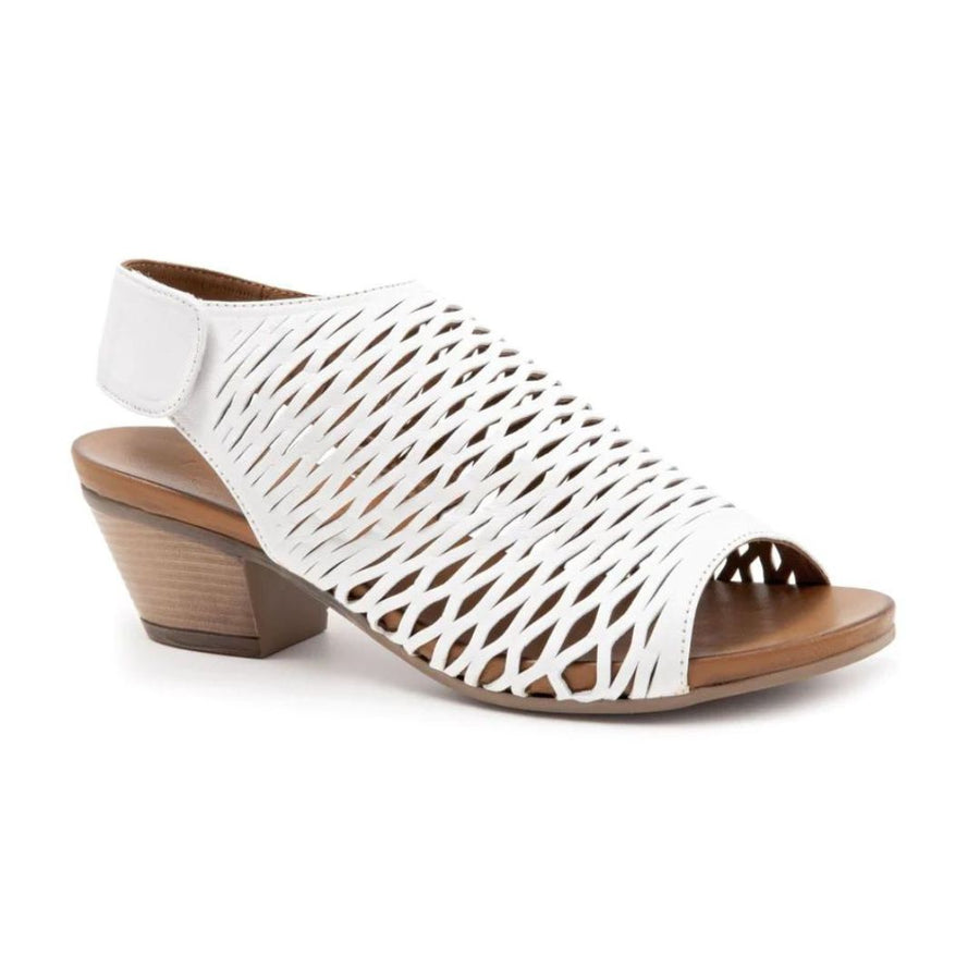 A white leather caged sandal with low heel and adjustbale backstrap. The Lacey by Bueno has a brown outsole.