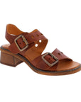 Brown sandal with backstrap and two adjustable straps with oversized buckles.