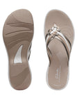 Bronze, beige and white strappy thong sandal with white midsole and brown outsole. Beige and white rubber outsole has Clarks logo on heel.