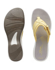 Top and side view of thong sandal with white and grey footbed and yellow upper with cute Velcro close detail. Clarks logo imprinted on insole at heel.