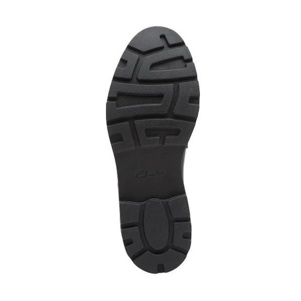 Black rubber outsole with Clarks logo in center.