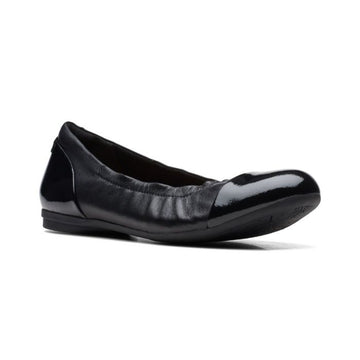 Black leather ballet flat with patent toe cap and heel.