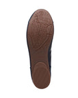 Brown rubber outsole with Clarks logo in center.