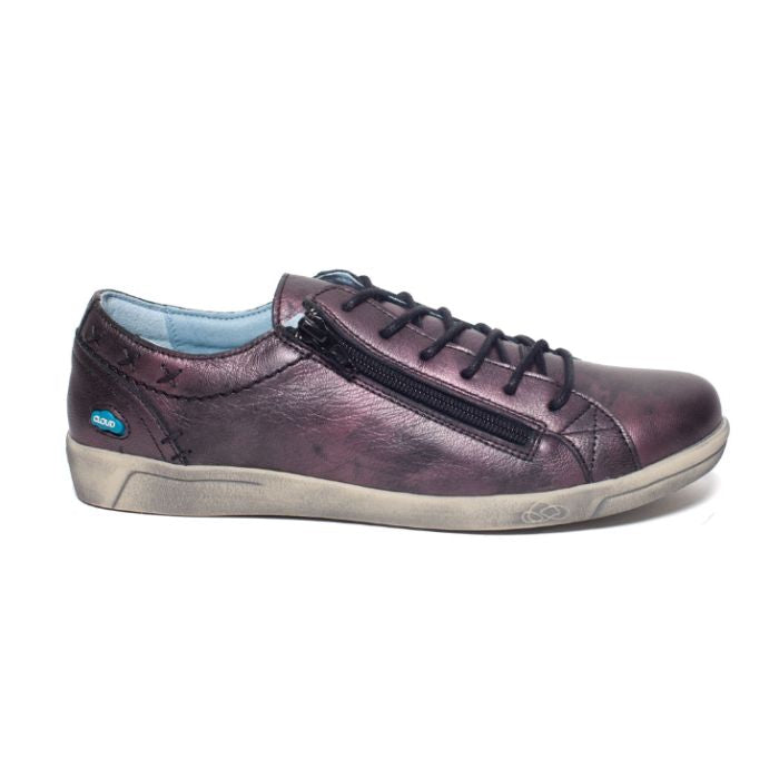 Purple metallic leather sneaker with lace and zipper closure and beige outsole. 
