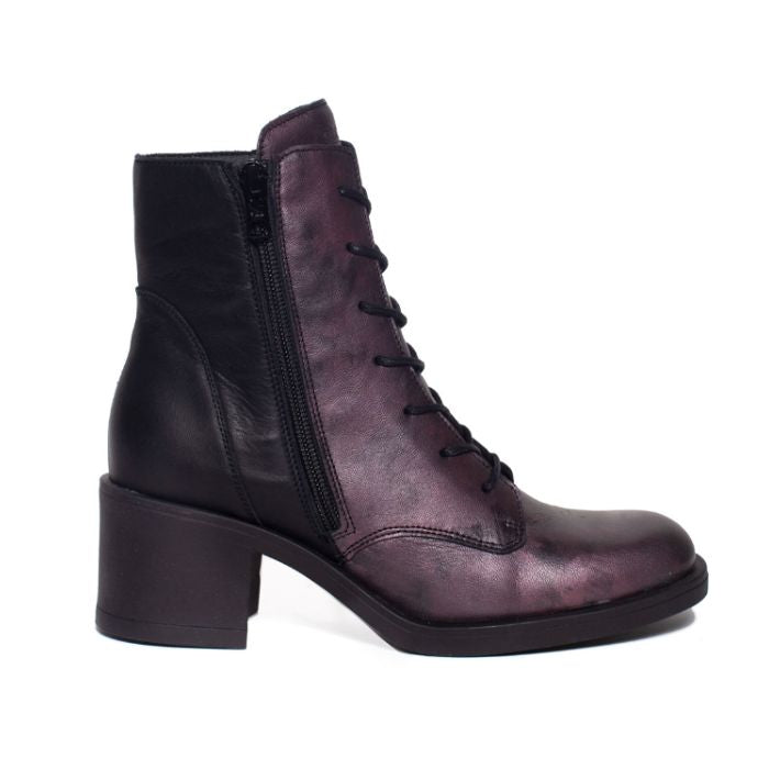 Inside view of purple and back heeled boot with zipper and lace closure.