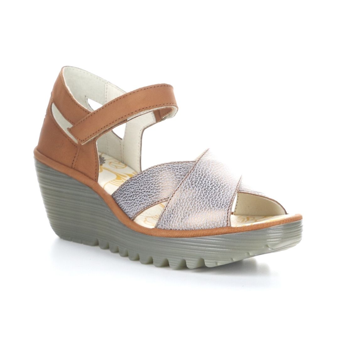 Fly London Yent, a closed heeled open-toe wedge in brown and pewter. Grey platform wedge. 