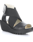 Black leather platform wedge with adjustable ankle strap.