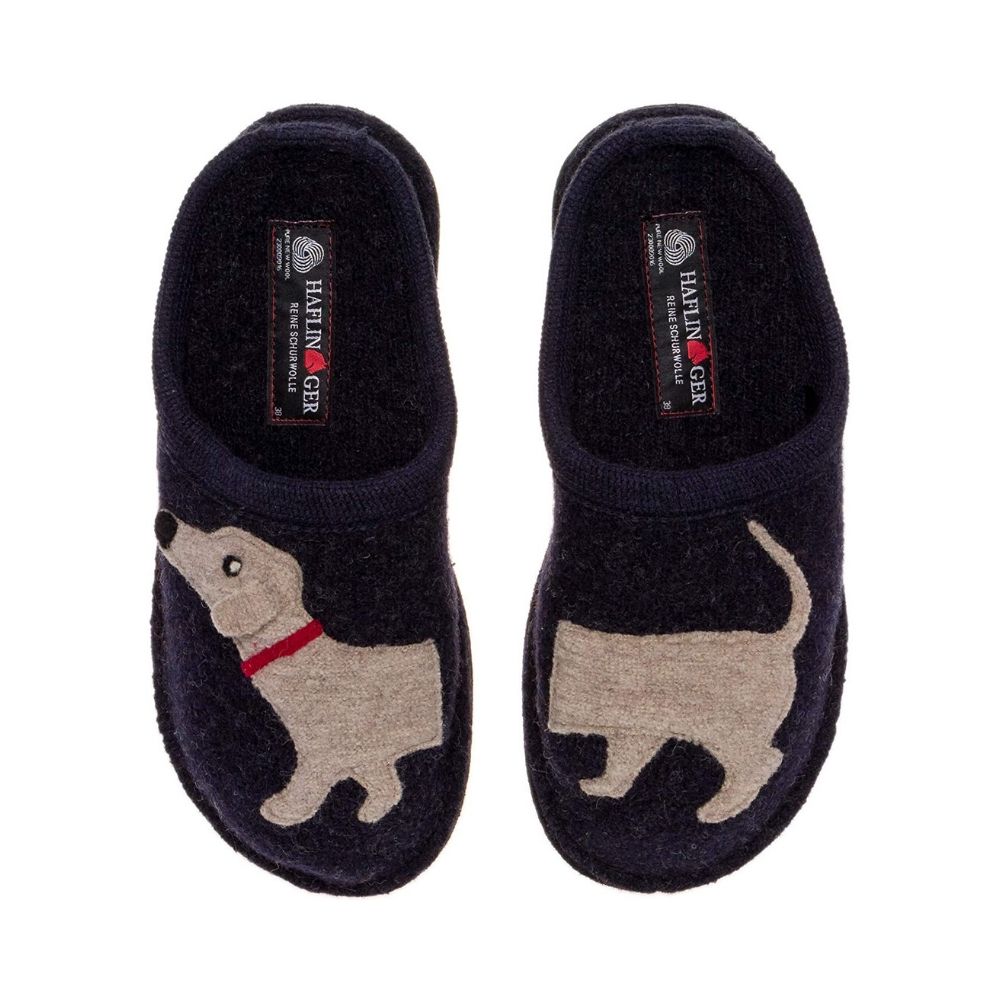 Navy wool slide slipper with beige dog design. Haflinger logo on inside of heels.