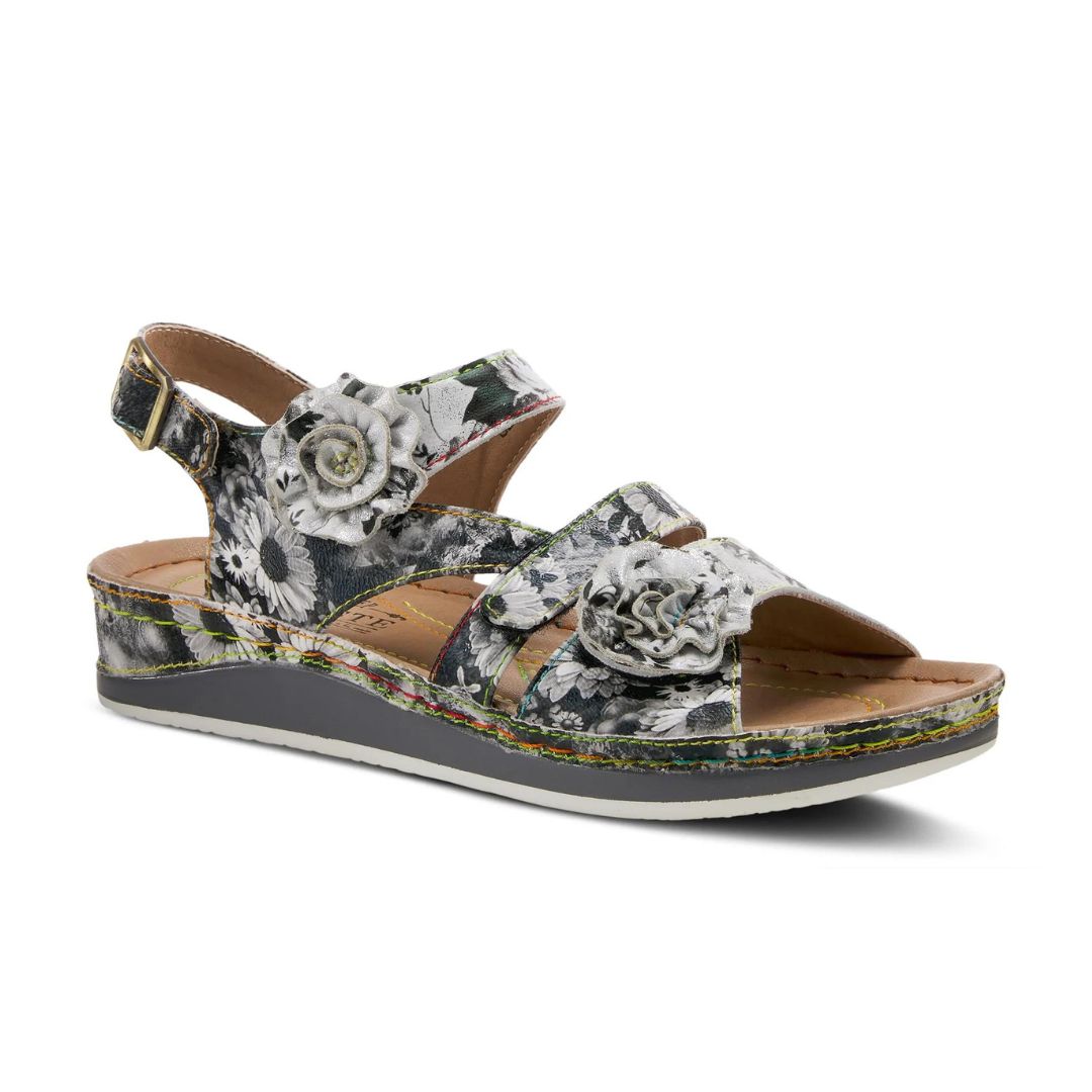 Black and white backstrap sandal with floral details.