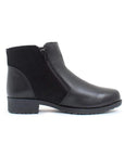 Black leather Chelsea boot with suede accent. Boot has inside zipper closure.