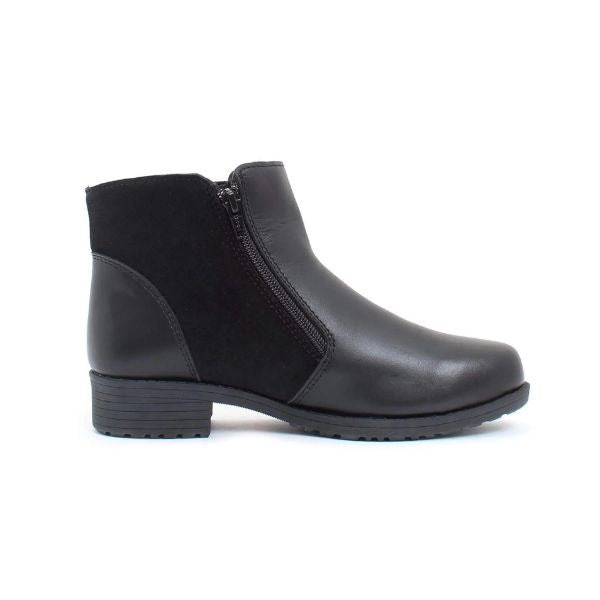 Black leather Chelsea boot with suede accent. Boot has inside zipper closure.