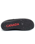 Black rubber outsole with red Canada marking on center.