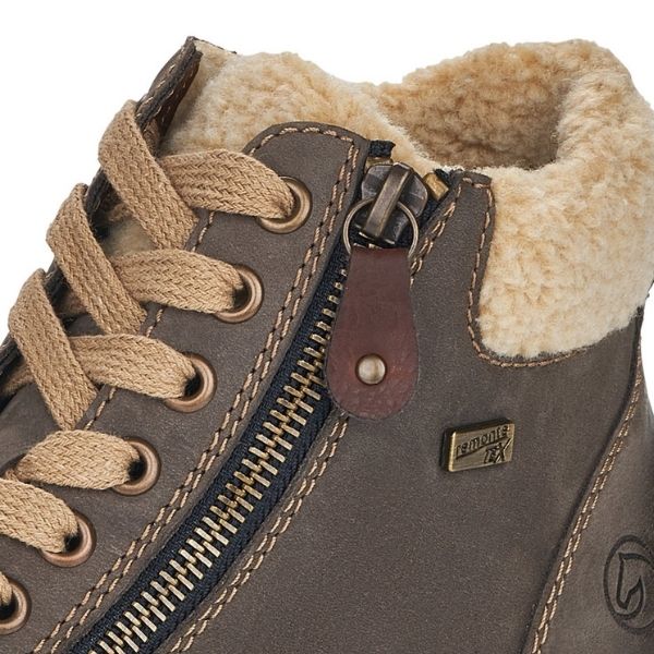 Grey sneaker boot with laces and outside functional zip. These have beige faux fur cuff and beige outsole.