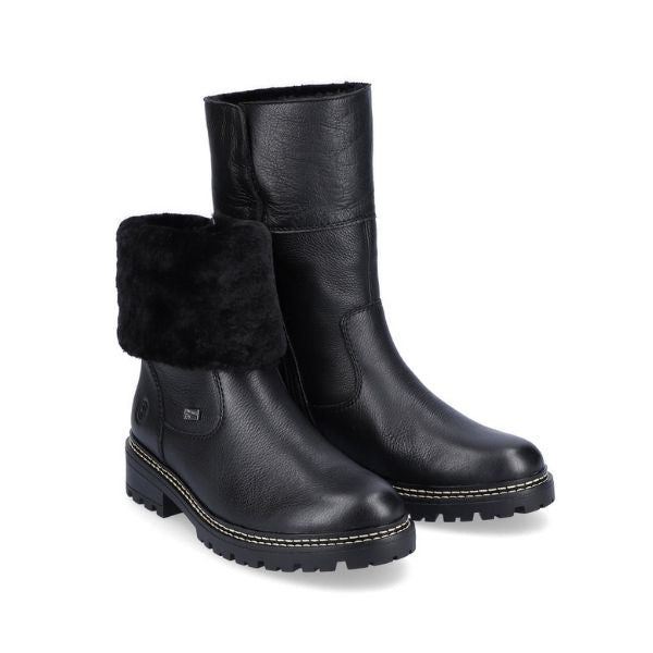 Black leather boot that can be worn mid-height or cuffed down exposing fur collar.