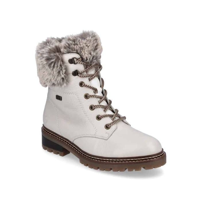 White leather lace-up boot with faux fur cuff and brown outsole.