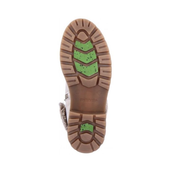 Brown rubber outsole with green ice gripping inserts.