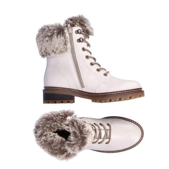 White leather lace-up boot with faux fur cuff and brown outsole. Boot has inside zipper closure