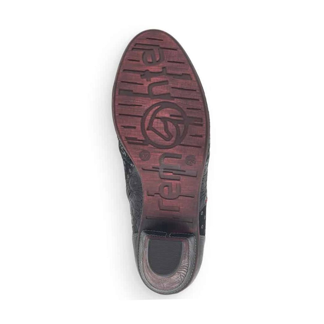 Red rubber outsole with Remonte logo on center.