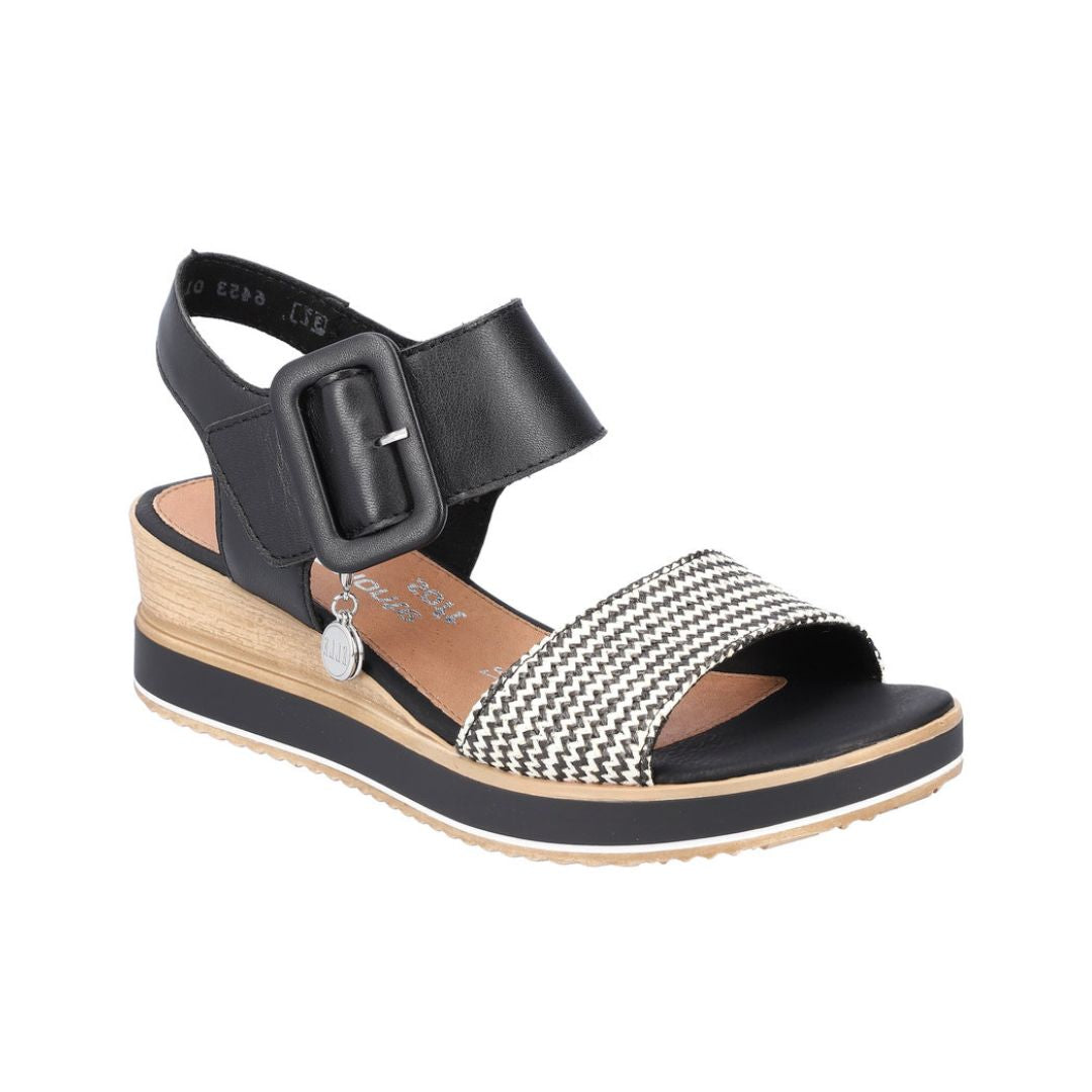 Black and white backstrap wedge sandal.