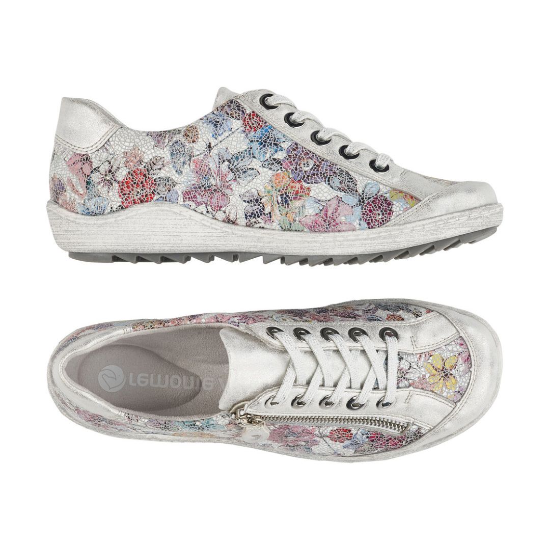 Top and side view of silver floral lace up shoe with zipper side closure and grey midsole. Remonte logo on insole.