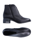Top and side view of black leather ankle boot with block heel. Inside zipper closure.